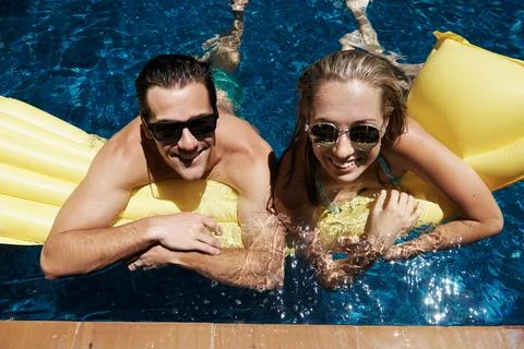 Relaxing in a poolside paradise Stock Photos