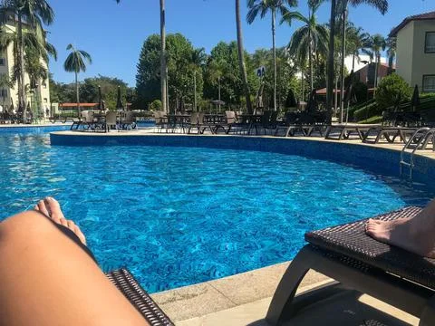 Relaxing by the Poolside 스톡 사진