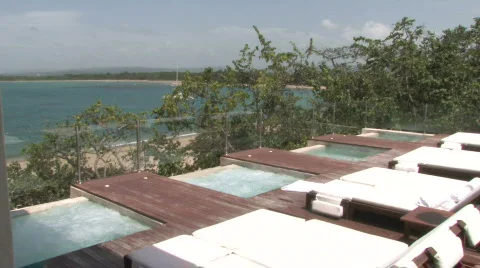 Relaxing Poolside Spa by the Ocean Stock Footage 489366