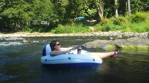 Relaxing on the River Stock Footage 10888433
