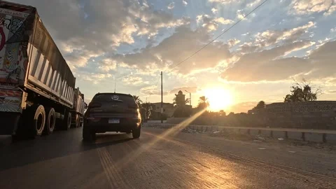 Relaxing road trip along Cairo Fayoum Desert Road wide open highway landscapes 動画素材 330079643