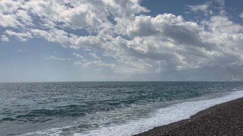 Relaxing sea waves and cloudy sky Stock Footage 239255236