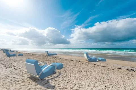 Relaxing seats on the beach Stock Illustration