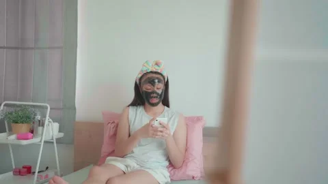 Relaxing Self-Care Routine with Face Mask Stock Footage 314569934