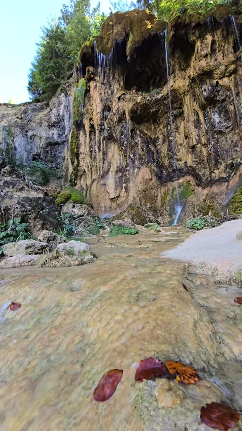 Relaxing slow motion video of clear water stream Stock Footage 318434317