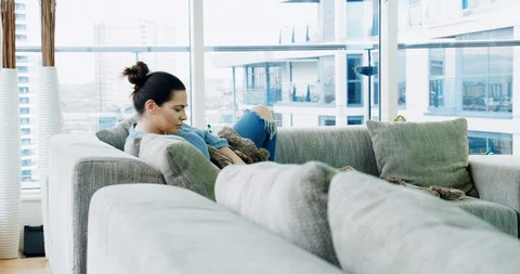 Relaxing on sofa Stock Footage 129761435