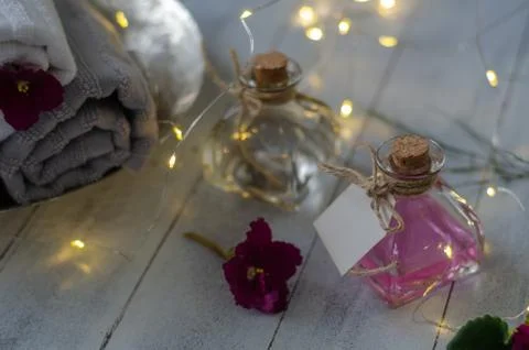 Relaxing spa set,light  and aromatherapy bottles Stock Photos