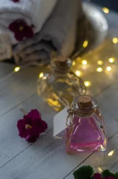 Relaxing spa set,lights  and aromatherapy bottles Stock Photos
