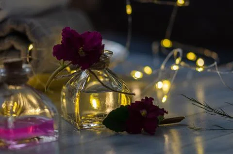 Relaxing spa set,lights  and aromatherapy bottles Stock Photos