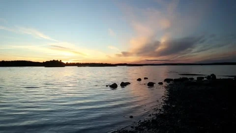 Relaxing sunset at the coastal beach Stock Footage 250476828