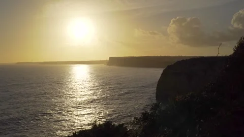 Relaxing sunset view over ocean with cliffs from Portugal Stock Footage 273675025