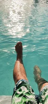 Relaxing in a swimming pool Stock Photos