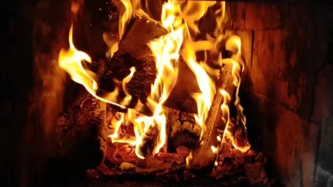 Relaxing video of fire in the fireplace in cold autumn Stock Footage 201341474