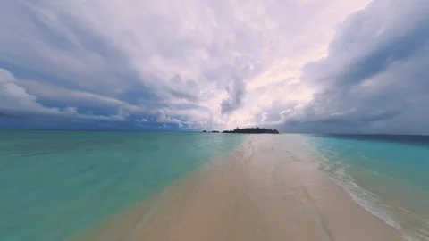 Relaxing view with incipient thunderstorm from a flooded sandbank onto a lonely  Stock Footage 240937786