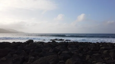 Relaxing View of Ocean Waves and Rocky Seashore in Slow Motion Stock Footage 116110462