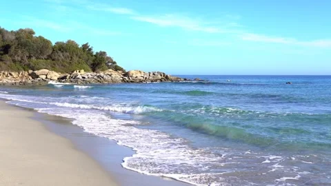Relaxing Waves On A Beautiful Empty Sandy Beach Stock Footage 266885617