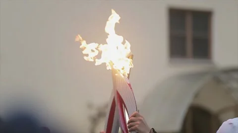 Relay race Olympic flame in Saint Petersburg in October. Process of pass flame Stock Footage 62878853