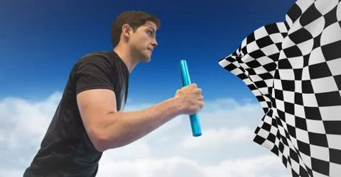 Relay runner against clouds and blue sky and checkered flag Stock Photos