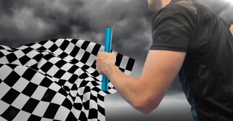 Relay runner mid section and flare against stormy sky and checkered flag Stock Photos