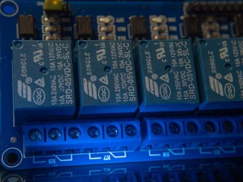 Relays on Circuit Board: Electronic Components for Automation Stock Photos