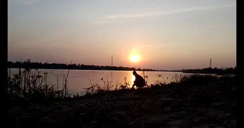 Release snails into the river Stock Footage 297725544