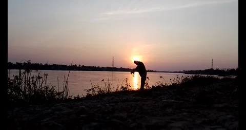 Release snails into the river Stock Footage 297725595
