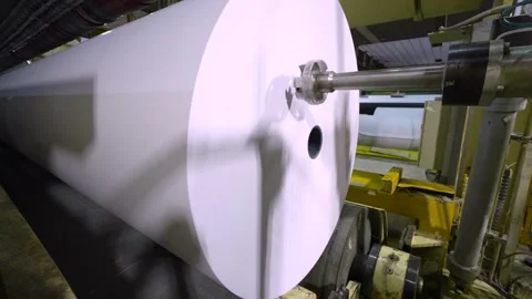 Release of white paper in rolls from a cutting machine. Paper production Stockbeeldmateriaal 301506872