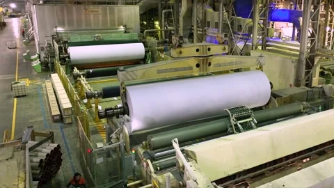 Release of white paper in rolls from a cutting machine. Paper production Video stock 302017068