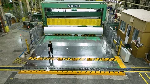 Release of white paper in rolls from a cutting machine. Paper production Video stock 302071812