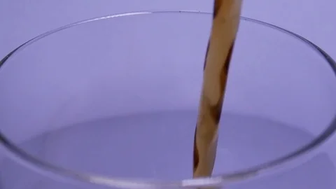 Releasing Bubbles And Foaming In Parkling Water Stock Footage