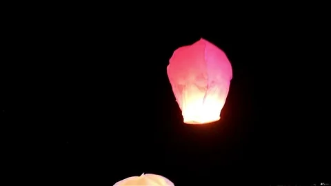 Releasing sky lanterns Stock Footage 83503555