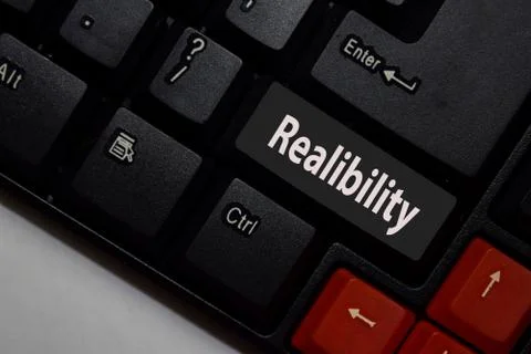 Reliability isolated on laptop keyboard background Foto stock