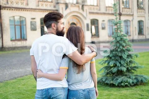 Reliable and full of trust. Pretty woman feeling trust and confidence in mans Stock Photos
