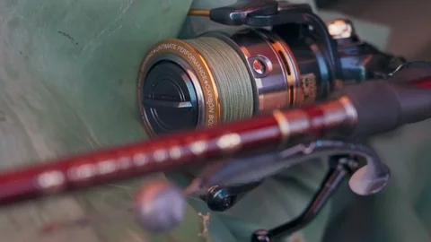 Reliable and high-quality spinning and fishing reel closeup Stock Footage 127064483