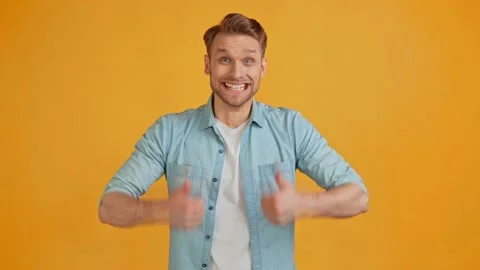 Reliable crazy adviser guy raise two thumbs up approve choice Stock Footage 161702740