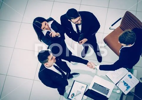Reliable handshake business partners after the discussion of th Stock Photos