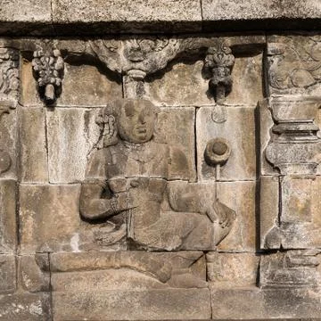 Relief at borobudur temple on java, indonesia Stock Photos