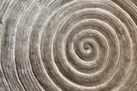 Relief pattern on a stone in the form of a spiral relief pattern on a ston... Stock Photos