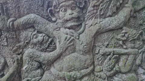 Relief stone carving of Monkeys in the Monkey Forest, Ubud, Bali, Indonesia. Video stock 271469760