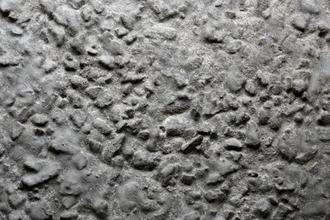 Relief surface cured concrete. Stock Photos