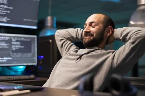 Relieved Developer Leaning Back After Coding Stock Photos