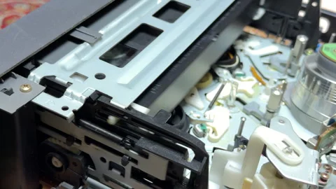 Relieved VCR Ejects Magnetic Tape Creating A Rhythmic Mechanical Clatter Stock Footage 328694467