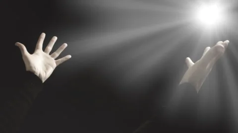 Religion hands light rays Stock Footage