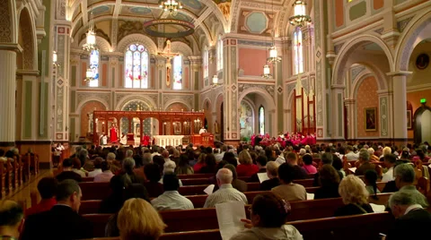 RELIGION RELIGIOUS PEOPLE ATTENDING A MASS AT A CHURCH HD HIGH DEFINITION Stock Footage