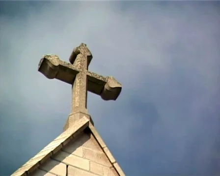 Religious cross with loopable sky background (PAL) Stock Footage