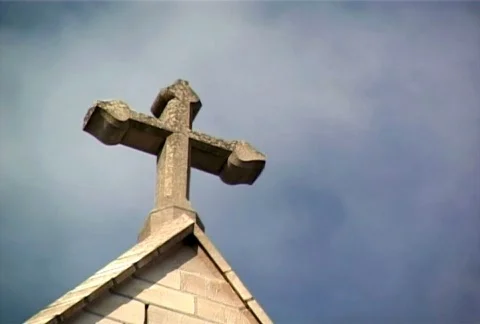 Religious cross with loopable sky background (NTSC) Stock-Footage 377499
