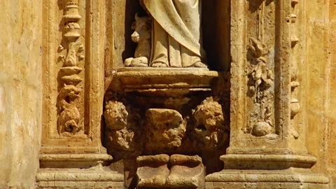 Religious details from outer wall of old church in Santo Domingo. Video stock 233297239
