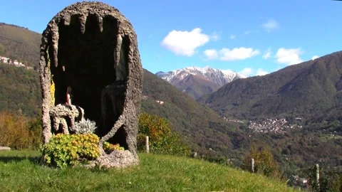 Religious devotion and view from Parlasco over the Valsassina Vídeo Stock 141321906