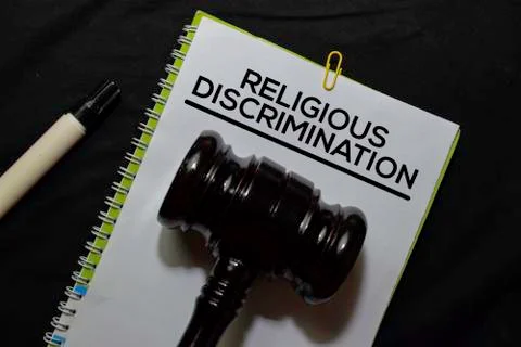 Religious Discrimination Document form and Black Judges gavel on office desk. Stock Photos