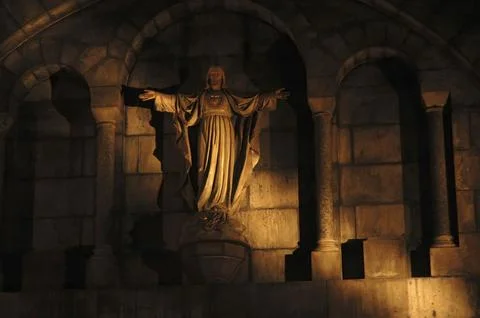 Religious image pierced by a ray of light Stock Photos